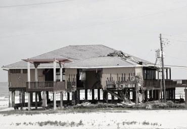 wind damage - spray foam can help prevent uplift to Mobile roofs